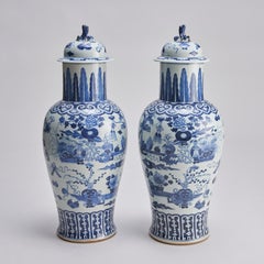 An impressive pair of Chinese porcelain blue and white covered vases