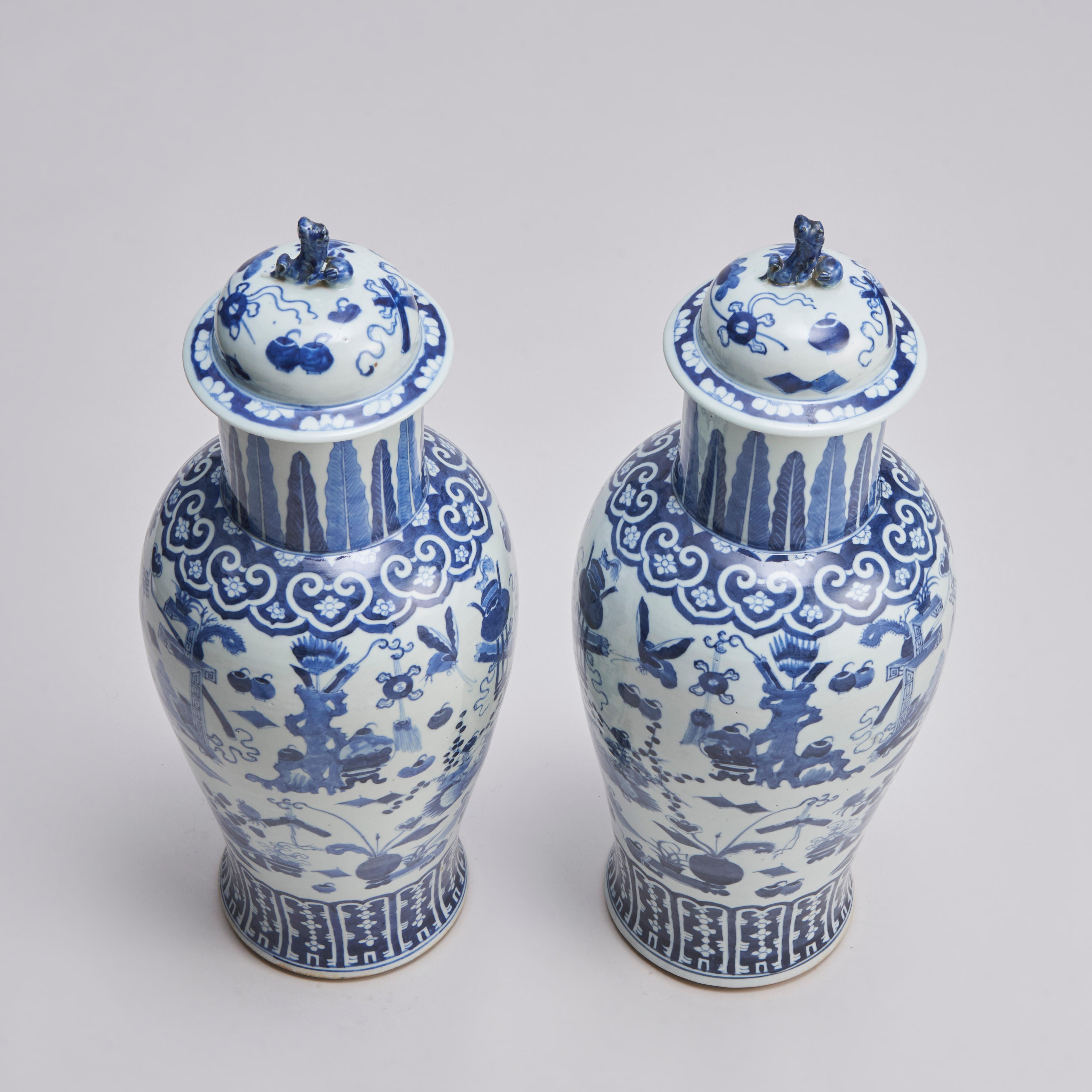 Porcelain An impressive pair of Chinese porcelain blue and white covered vases For Sale