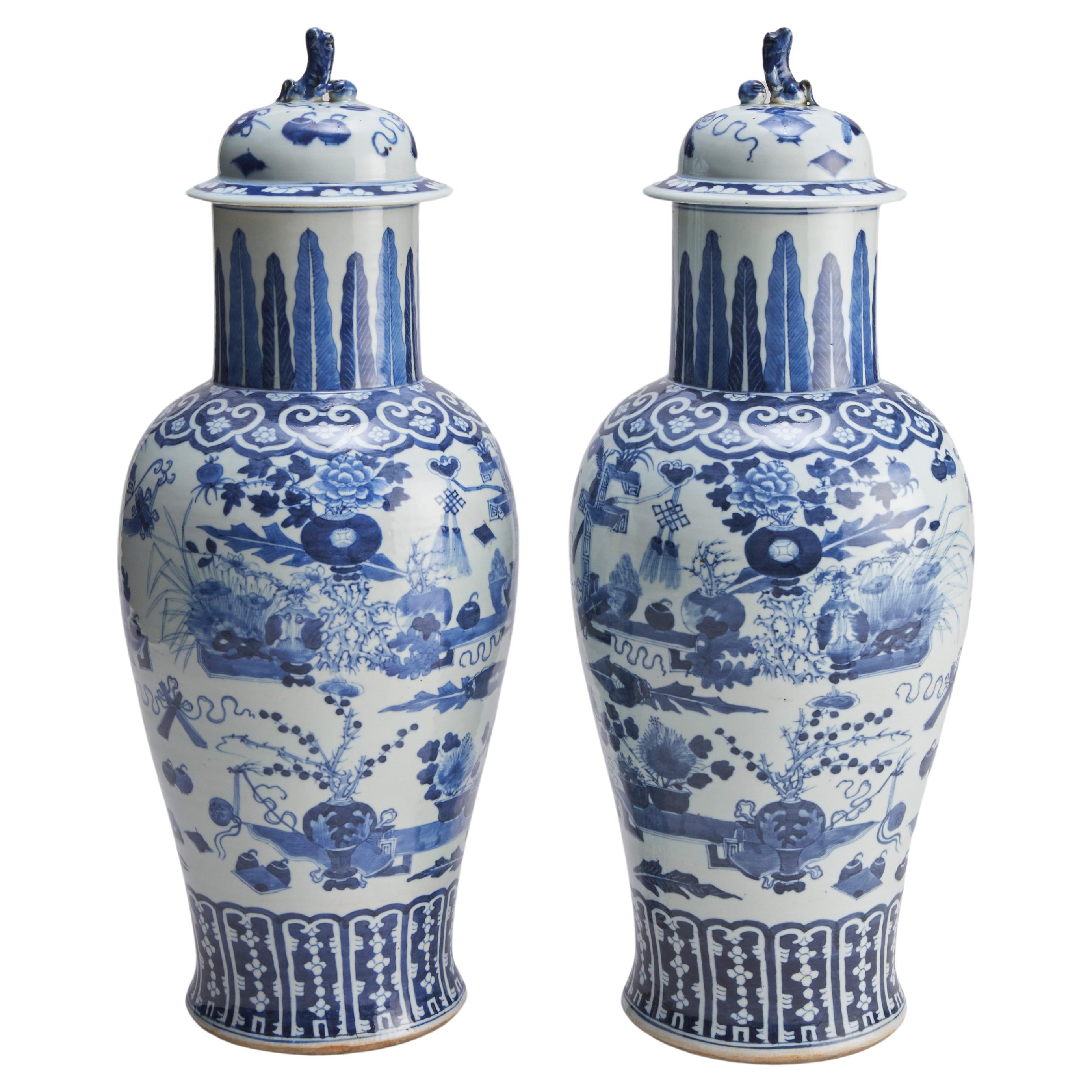 An impressive pair of Chinese porcelain blue and white covered vases For Sale