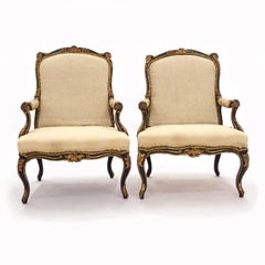 Impressive Pair of French Mid 18th Century Black and Gilt Rococo Armchairs