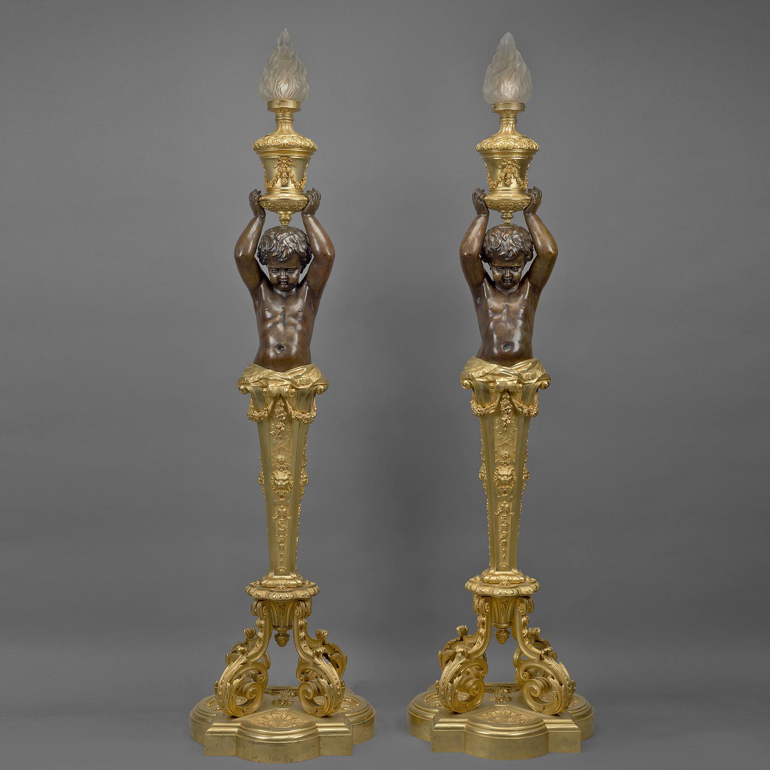Une impressionnante paire de torchères figuratives en bronze doré de Napoléon III par Goelzer et Poumaroux, Paris. 

Signé sur les socles 