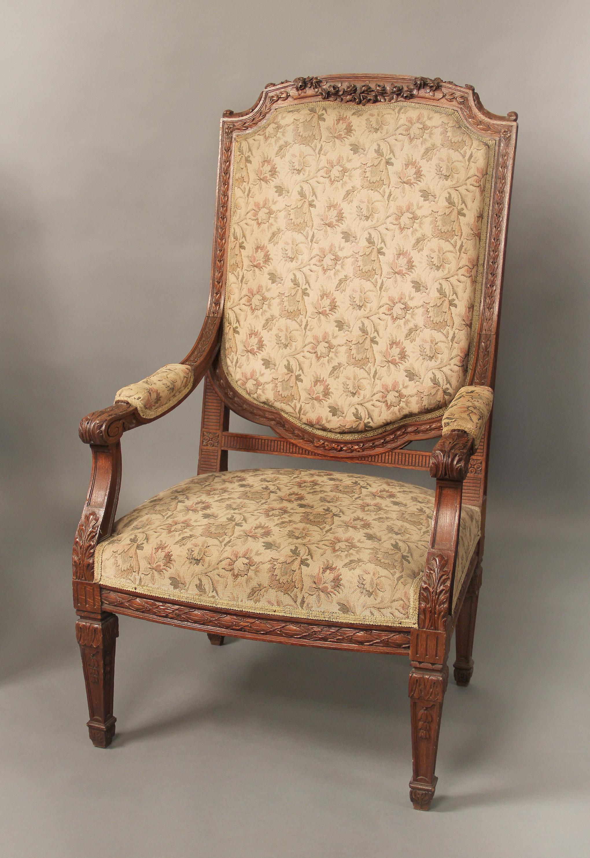 An impressive set of four late 19th century Louis XVI style carved wood armchairs

The oversized chairs with high backs and wide seats, hand carved strong and sturdy floral designed wood frames.