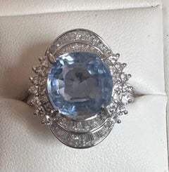 An Impressive Unheated 7.52ct Light Blue Sapphire Platinum & Diamond Ring