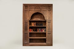 An Indian Carved Arch Modified into Bookshelf