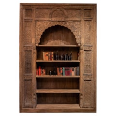 An Indian Carved Arch Modified into Bookshelf