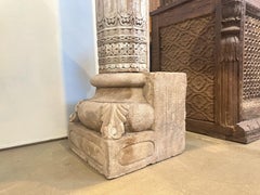 An Indian Haveli Architectural Facade with Three Windows and a Balcony