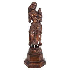 An Indian Raj period carved figure of the Goddess Parvati, circa 1900