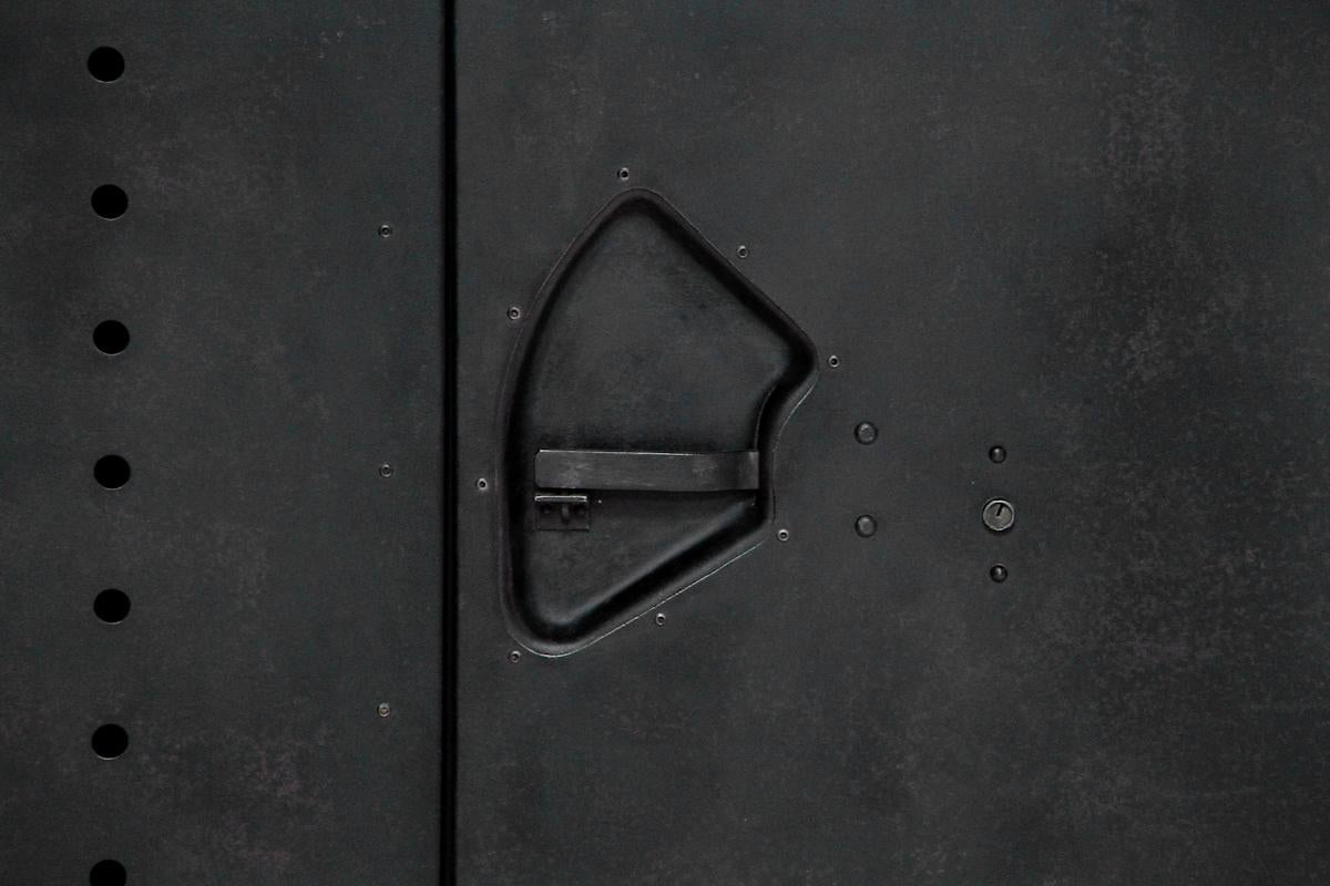 An industrial two door cabinet marked No.195 2