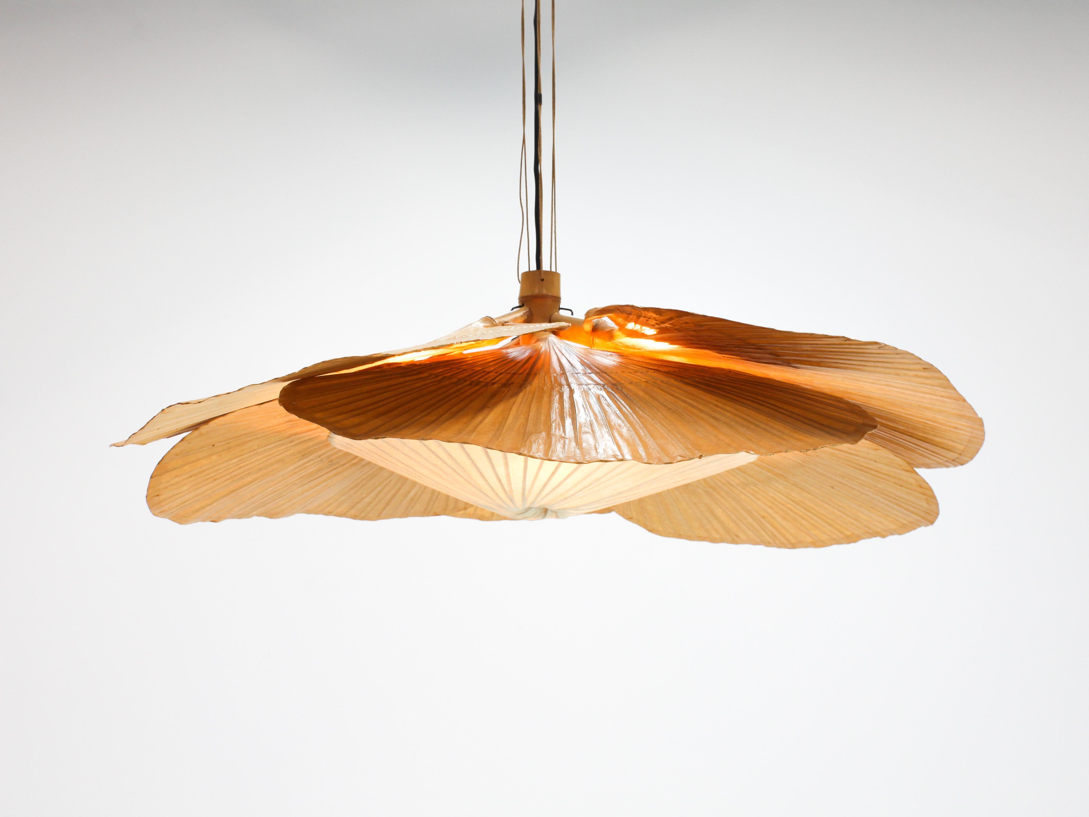 A wonderful and rare large six fan ‘Uchiwa Hana’ bamboo and Japanese rice paper chandelier by Ingo Maurer for M design, Germany, 1970s.

Ingo Maurer’s interest in paper for lampshades was linked with his interest in Japan. From 1973-1975 he