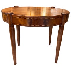 Antique An inlaid satinwood occasional oval table