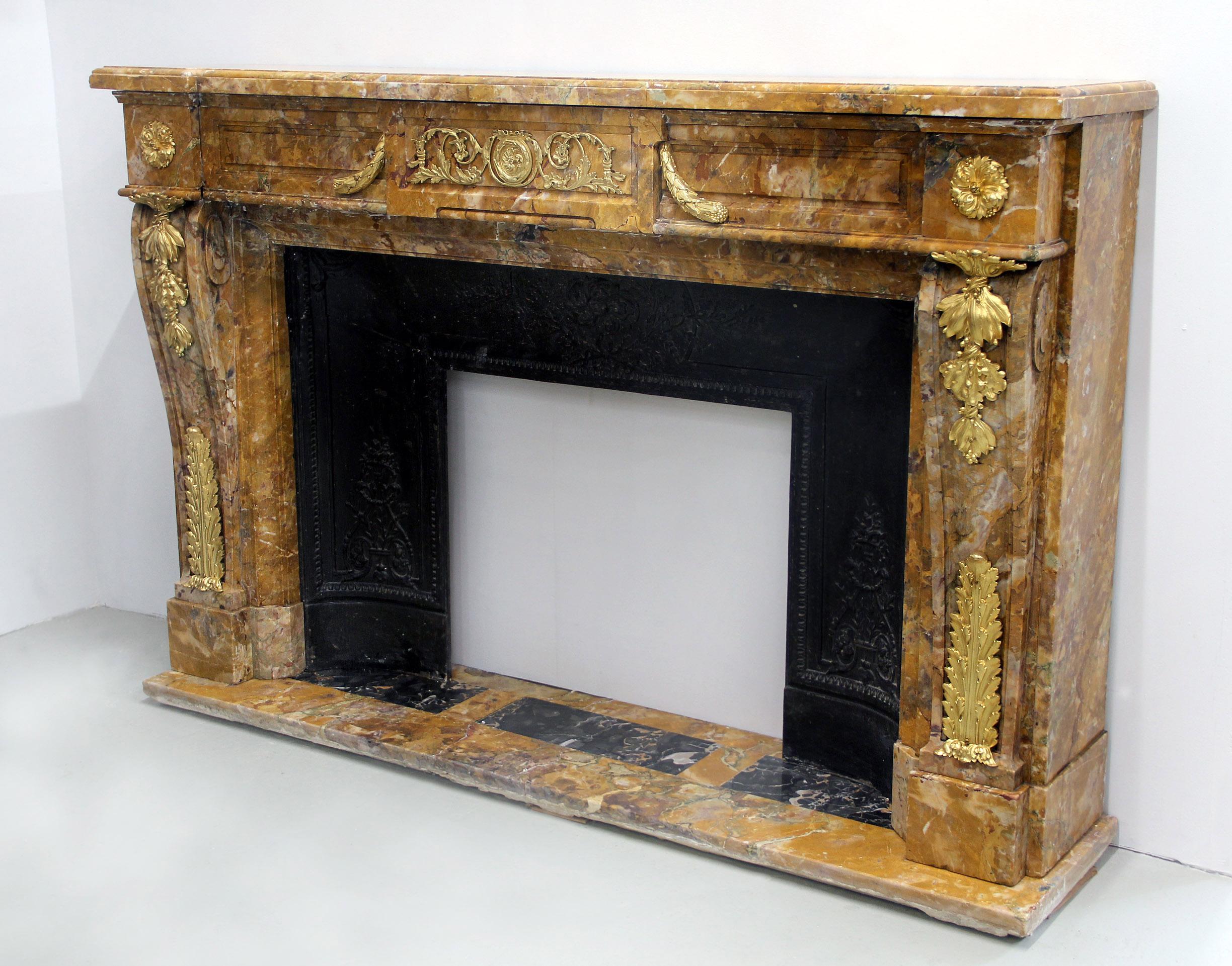 An Interesting 19th Century Gilt Bronze Mounted Giallo di Siena Marble Fireplace For Sale 4
