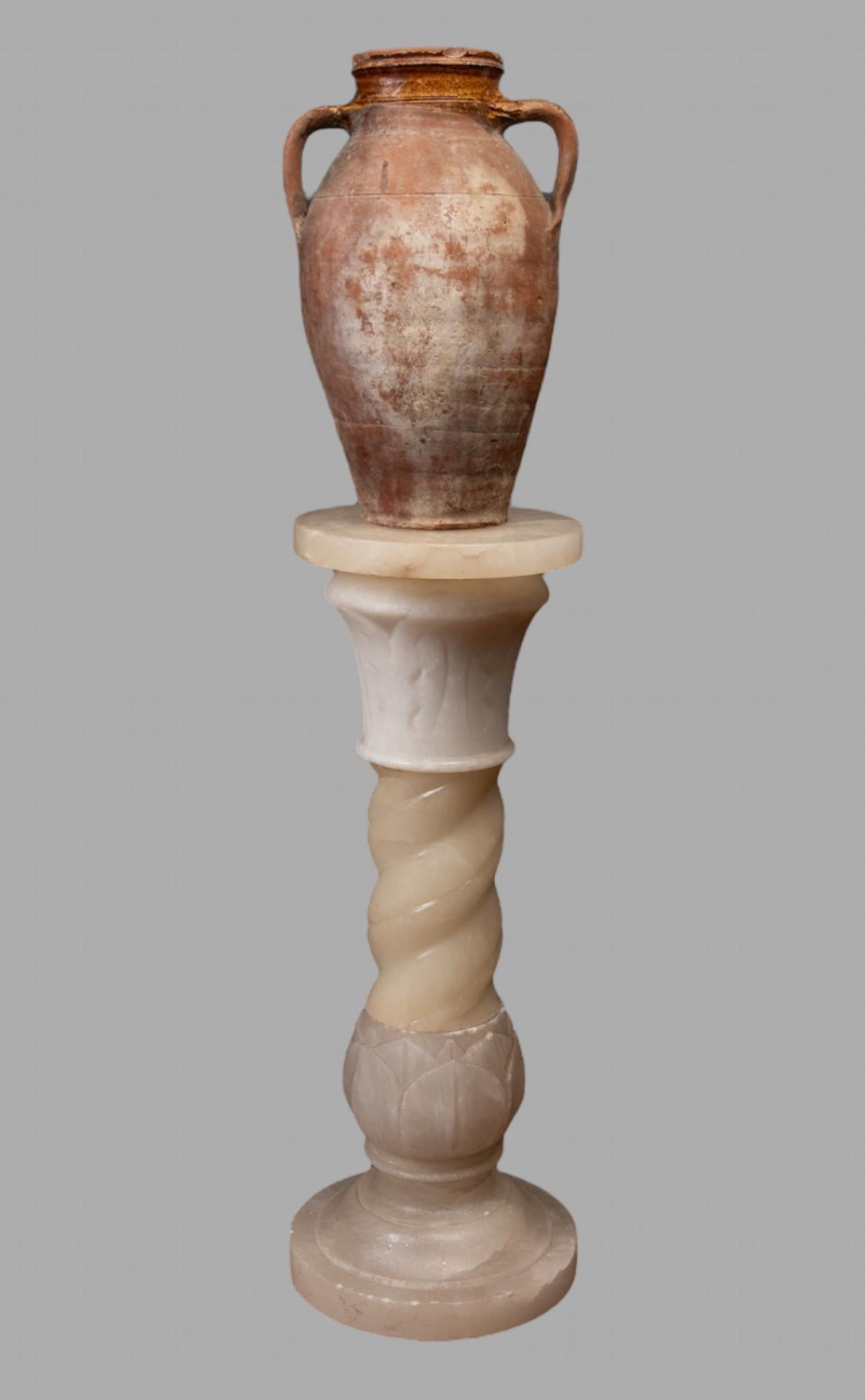 A c1930 Unusual Carved Alabaster Pedestal Column Lamp in five sections of which four bolt together . Very small chip to one piece.

Height 73 cm fully PAT tested.