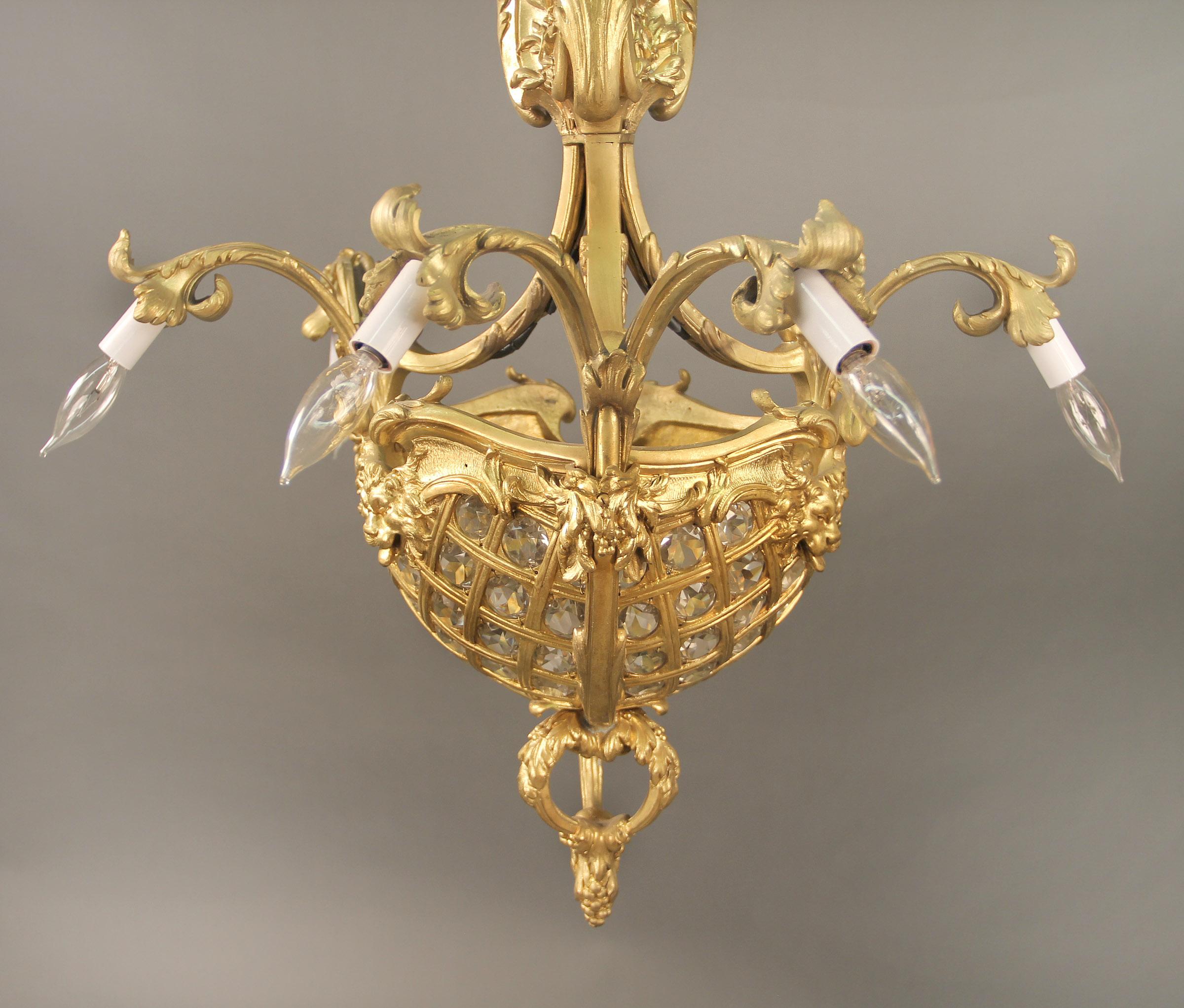 Doré Intéressant lustre à neuf lumières en bronze doré du début du 20e siècle en vente