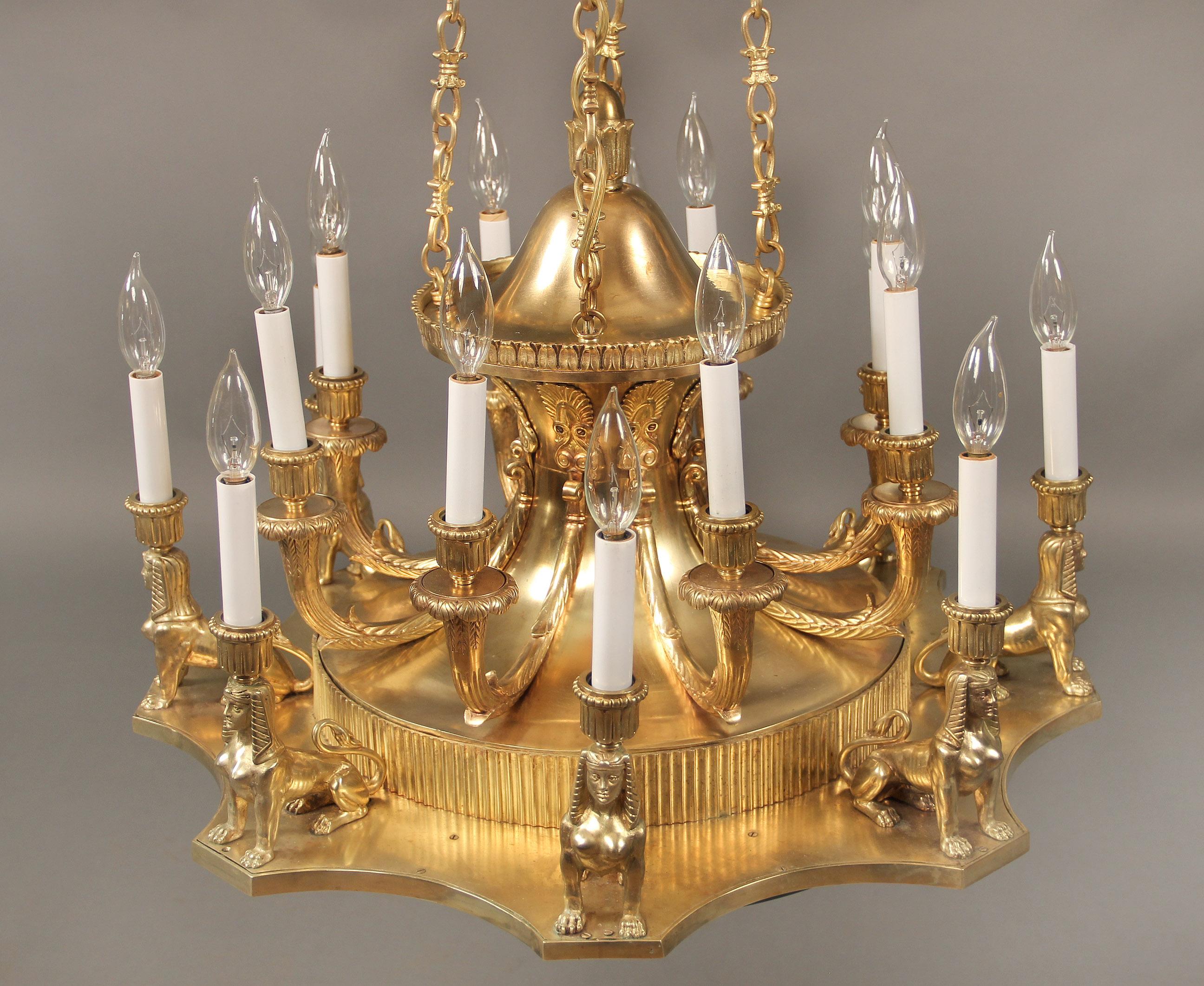 French Interesting Late 19th-Early 20th Century Gilt Bronze Empire Style Chandelier For Sale