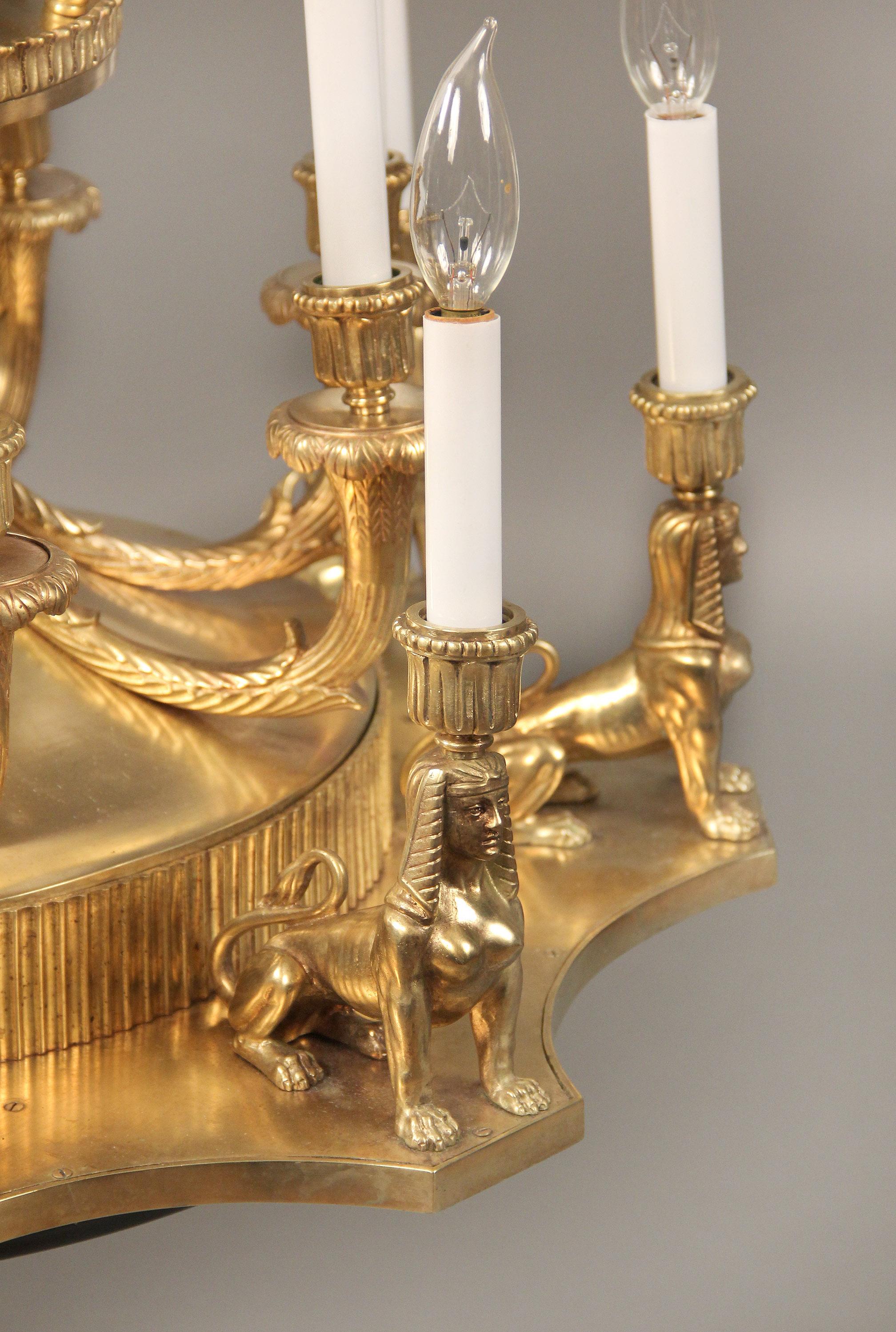 Interesting Late 19th-Early 20th Century Gilt Bronze Empire Style Chandelier In Good Condition For Sale In New York, NY