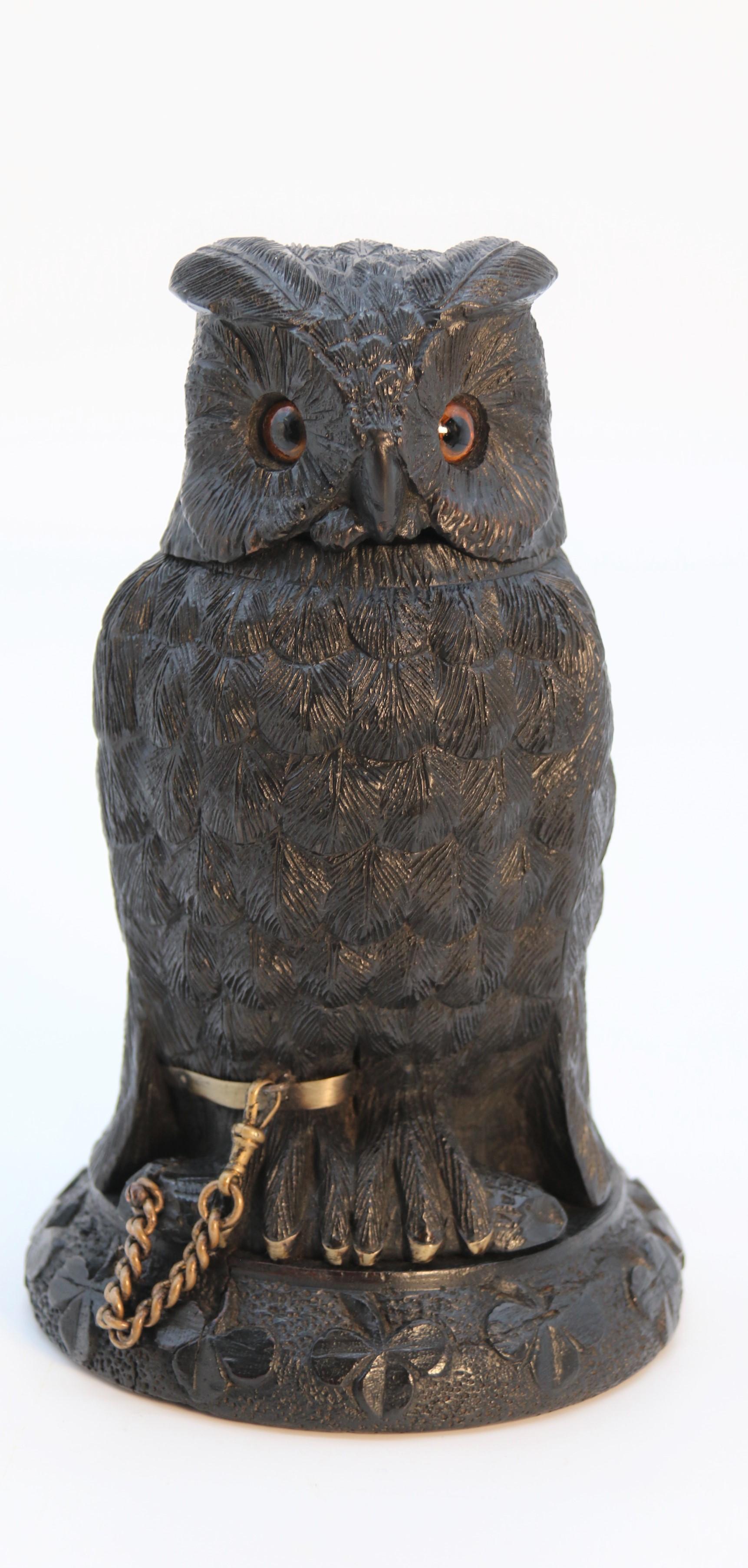 An Irish bog oak hand carved inkstand in the form of an owl
Attributed to Cornelius Goggin, Dublin Ireland

This exceptional bog oak inkstand is of a very rare and desirable form. It is beautifully hand carved as a perched pet owl. It is a museum