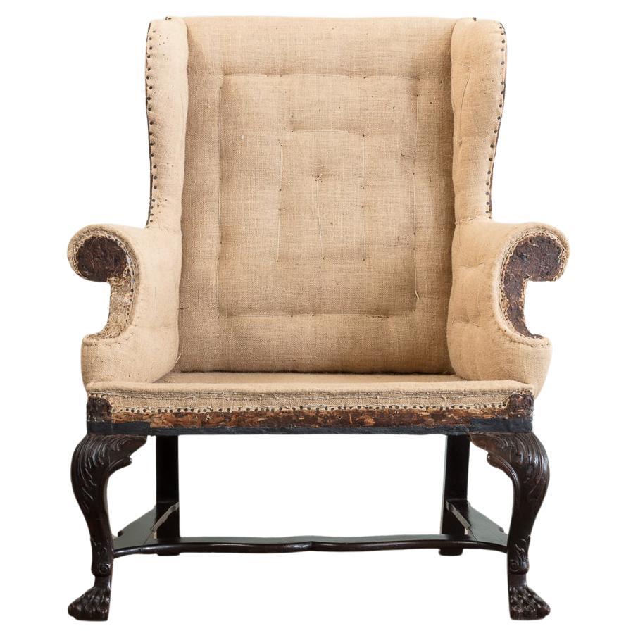 An Irish George II Mahogany Wingback Armchair