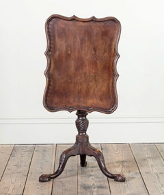 An Irish Walnut Galleried Tripod Tilt Top Table