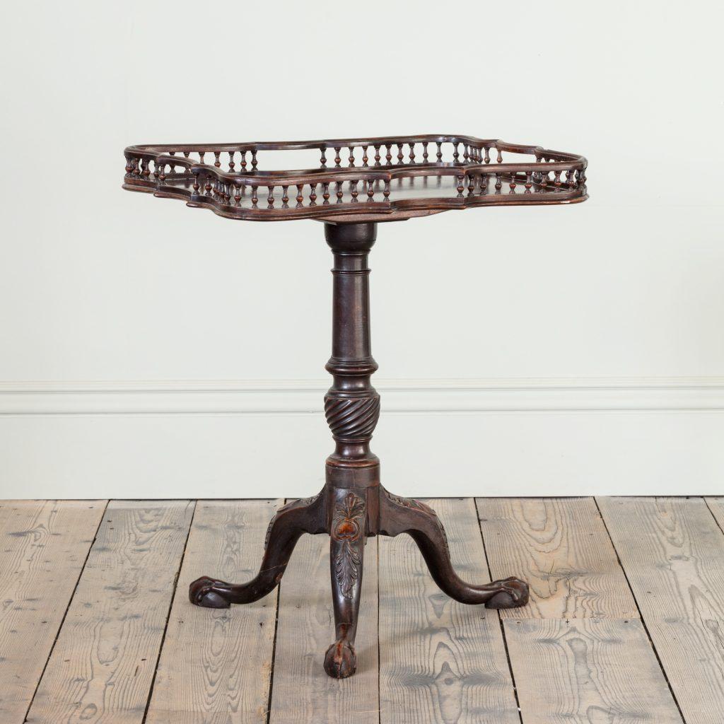 Carved An Irish Walnut Galleried Tripod Tilt Top Table For Sale