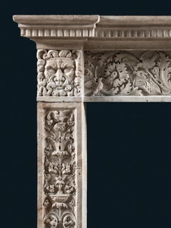 An Istrian Stone Chimneypiece with Grotesque Decoration