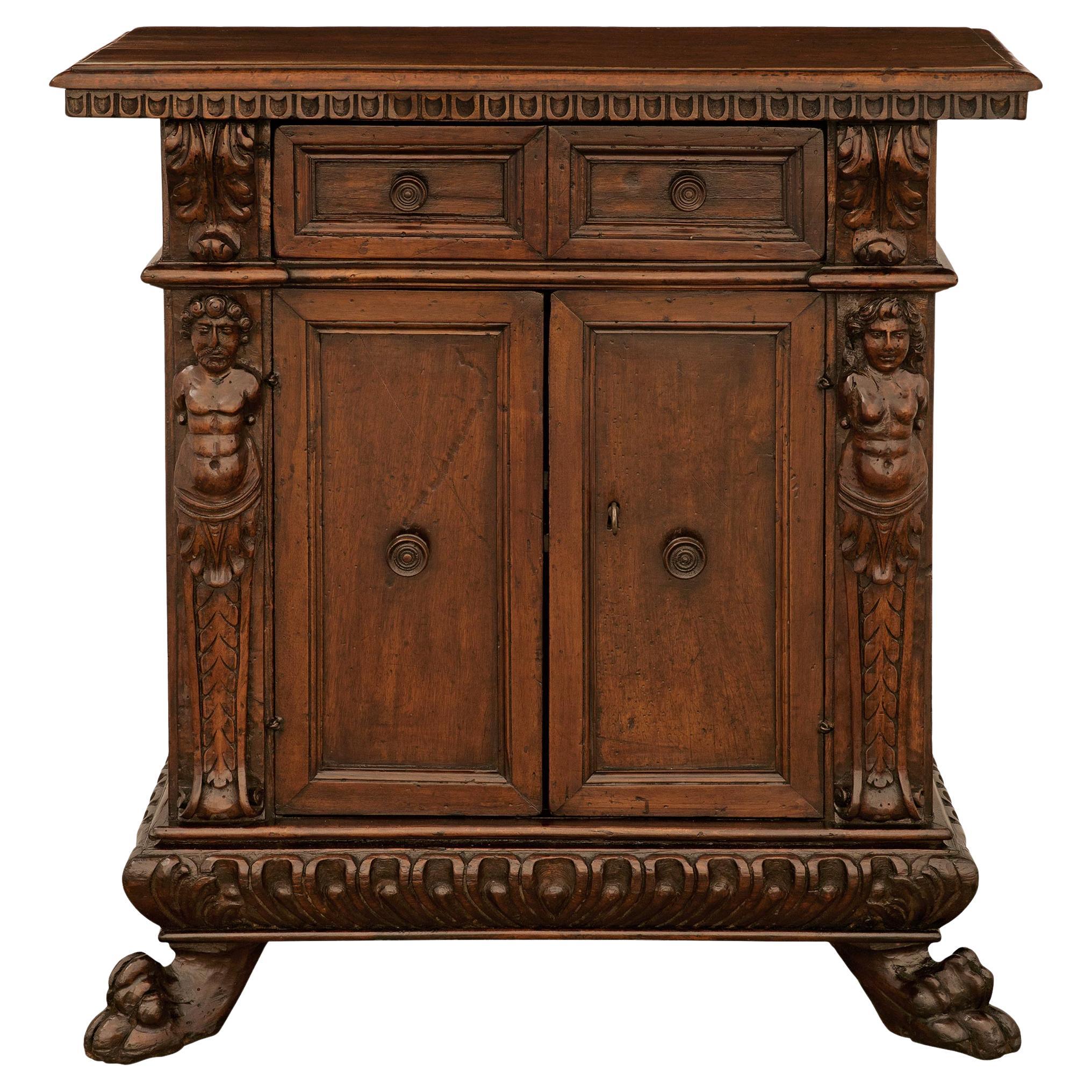 An Italian 17th century Baroque Period Walnut and Iron cabinet For Sale