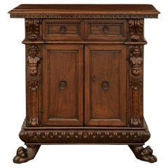 An Italian 17th century Baroque Period Walnut and Iron cabinet