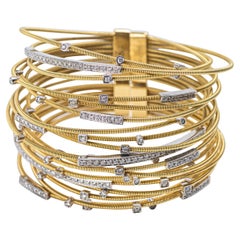 An Italian 18 Karat Gold and Diamond Expandable Bracelet, Signed 2324 AL