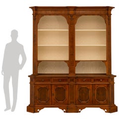 An Italian 18th century Baroque st. walnut cabinet