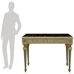 Una consola italiana del siglo XVIII, del estilo Luis XVI, de madera y mármol con pátina