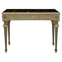 Una consola italiana del siglo XVIII, del estilo Luis XVI, de madera y mármol con pátina