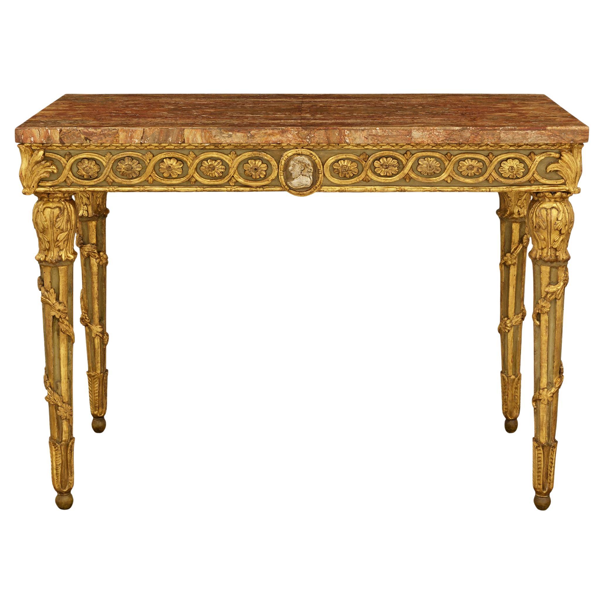 An Italian 18th century patinated Wood, Giltwood, Marble and Mecca console