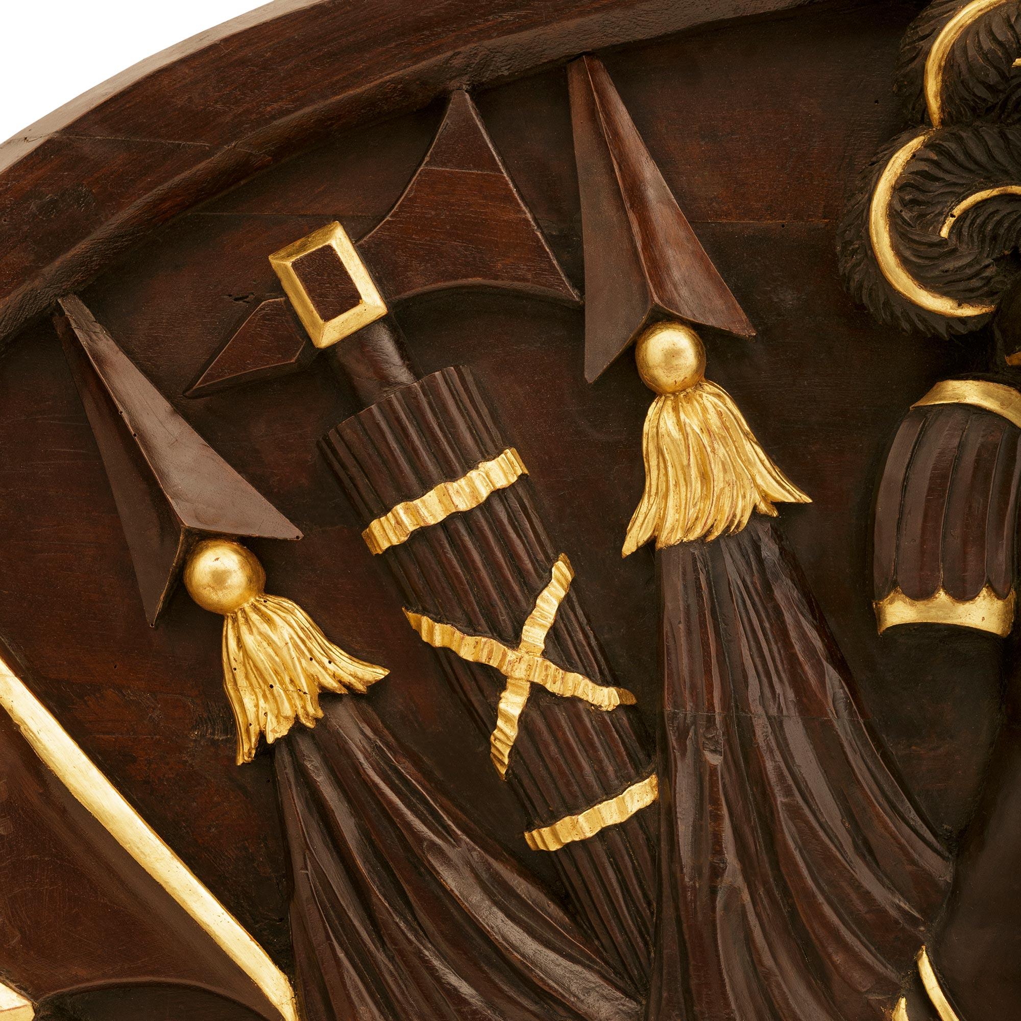 An Italian 18th century Neo-Classical st. patinated Wood and Giltwood plaque. For Sale 1