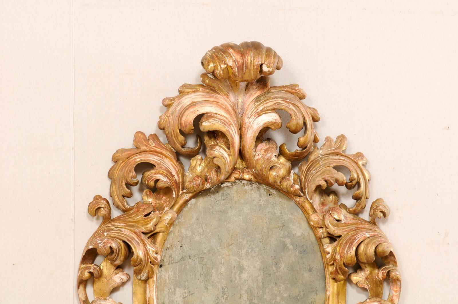 Italian 18th Century Richly Carved Acanthus Leaf Giltwood Antiqued Mirror In Good Condition In Atlanta, GA