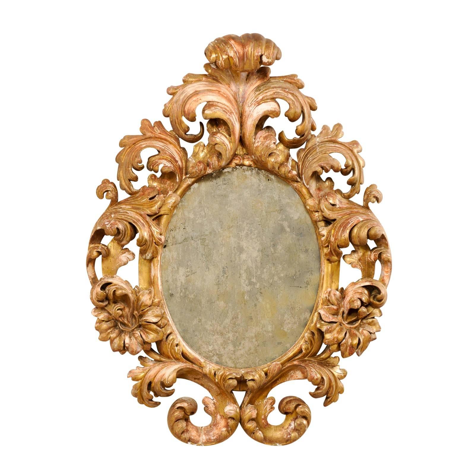 Italian 18th Century Richly Carved Acanthus Leaf Giltwood Antiqued Mirror