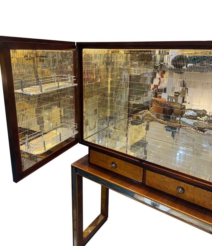 Mirror An Italian 1940s mirrored maple wood bar cabinet by Osvaldo Borsani For Sale