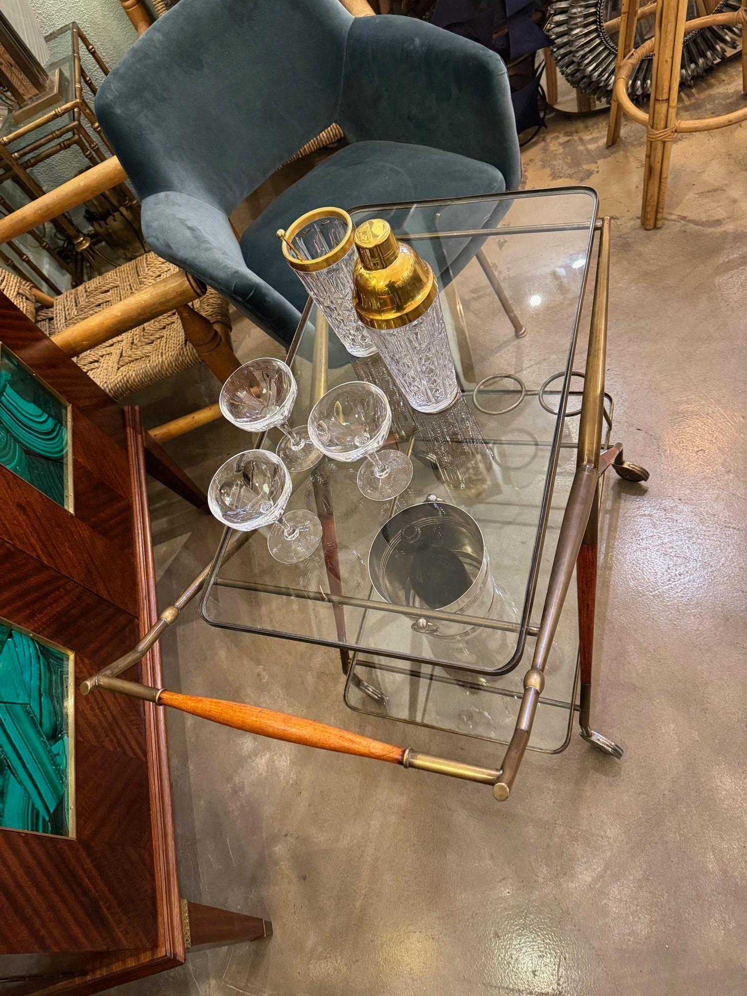 An Italian 1950s brass and lacquered wood bar trolley by Cesare Lacca For Sale 5