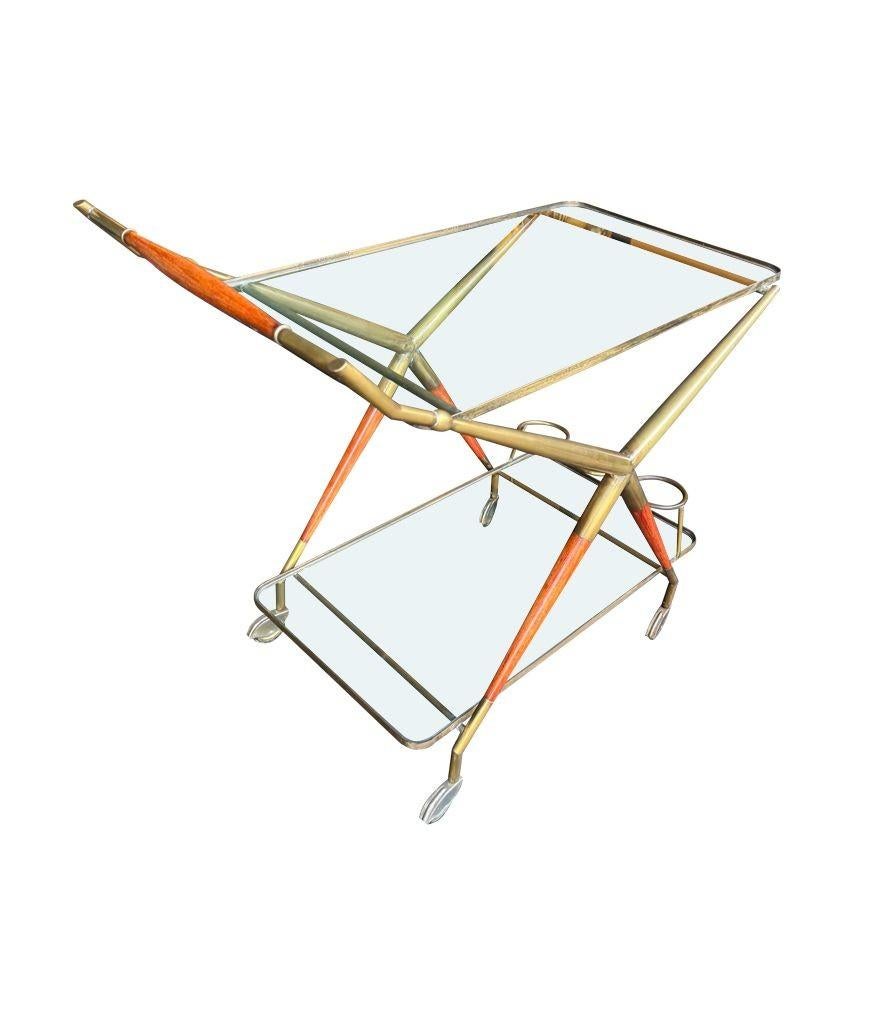 An Italian 1950s brass and lacquered wood bar trolley by Cesare Lacca For Sale 6