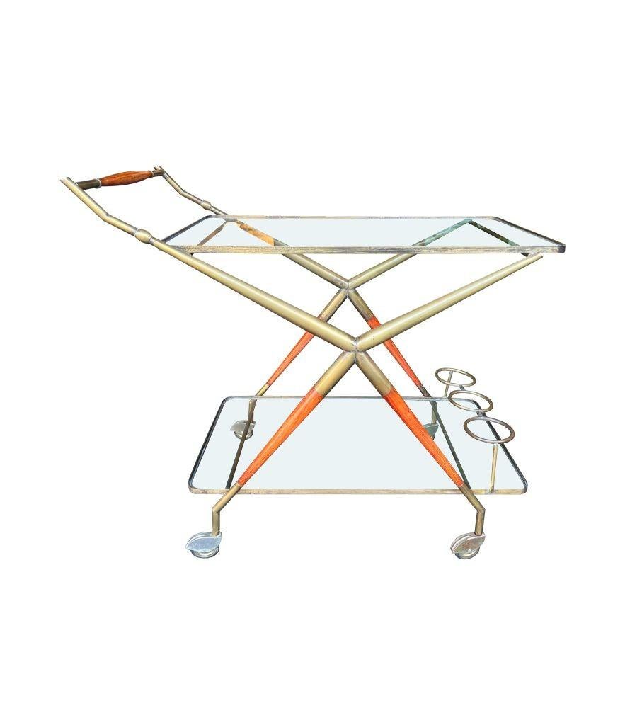 An Italian 1950s brass and lacquered wood bar trolley by Cesare Lacca For Sale 8