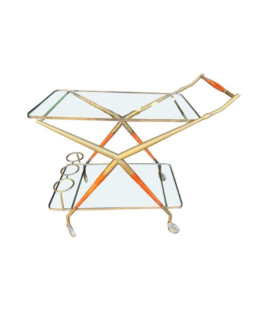 Brass An Italian 1950s brass and lacquered wood bar trolley by Cesare Lacca For Sale