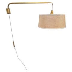 An Italian 1950s brass telescopic adjustable wall light