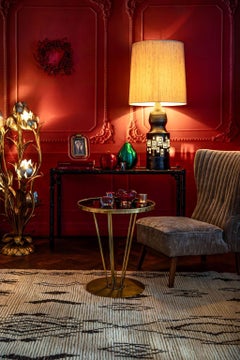 An Italian 1950s cocktail chair upholstered in mushroom velvet.
