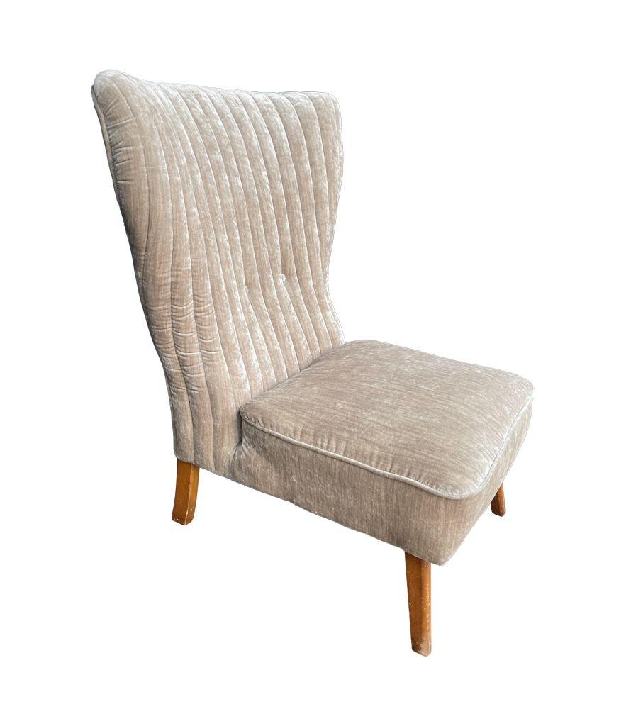 Mid-Century Modern An Italian 1950s cocktail chair upholstered in mushroom velvet. For Sale