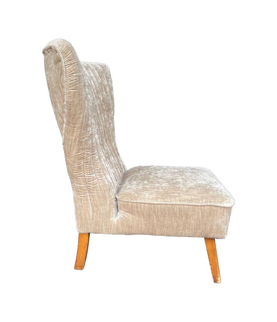 Mid-20th Century An Italian 1950s cocktail chair upholstered in mushroom velvet. For Sale