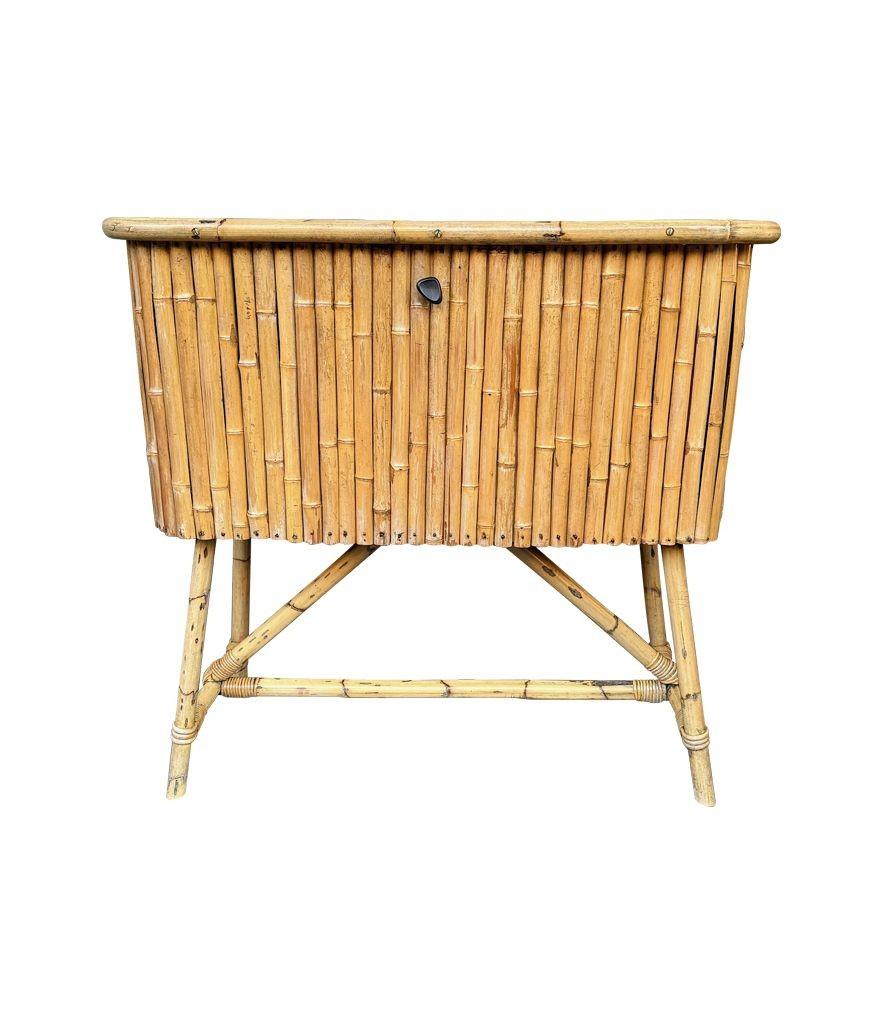 An Italian 1960s bamboo bar cabinet with red laminate top and two stools For Sale 5