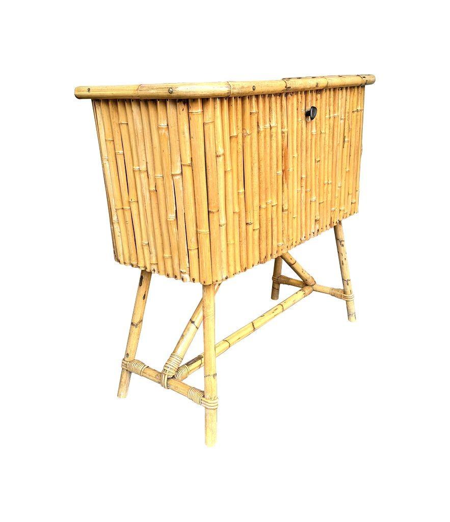 An Italian 1960s bamboo bar cabinet with red laminate top and two stools For Sale 7