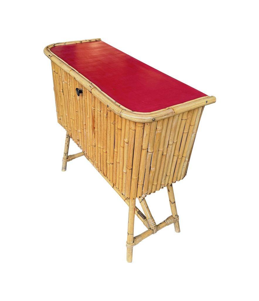 An Italian 1960s bamboo bar cabinet with red laminate top and two stools For Sale 8