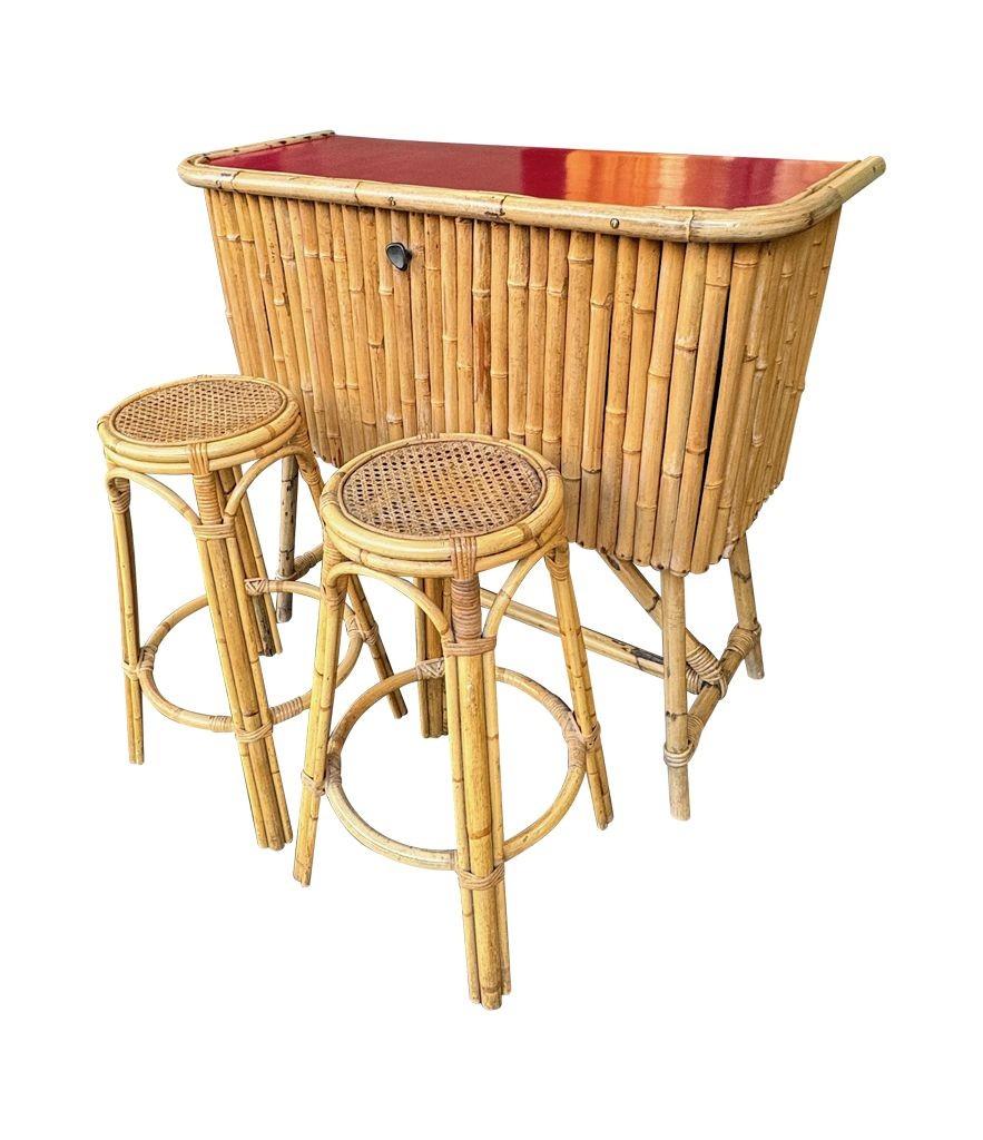 An Italian 1960s bamboo bar cabinet with red laminate top and two stools For Sale 12