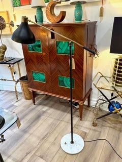 An Italian 1960s black enamel, brass and marble adjustable floor lamp by Stilux