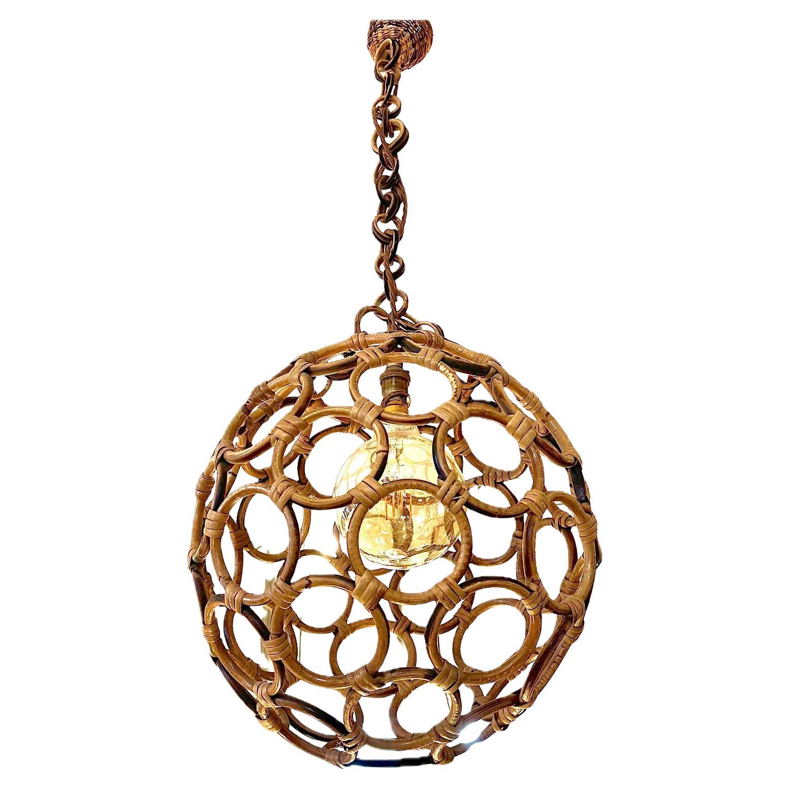 An Italian 1960s circular bamboo ball light in the style of Franco Albini