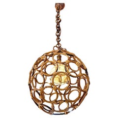 An Italian 1960s circular bamboo ball light in the style of Franco Albini